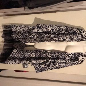 Black and white over peas abstract with fringe in the bottom